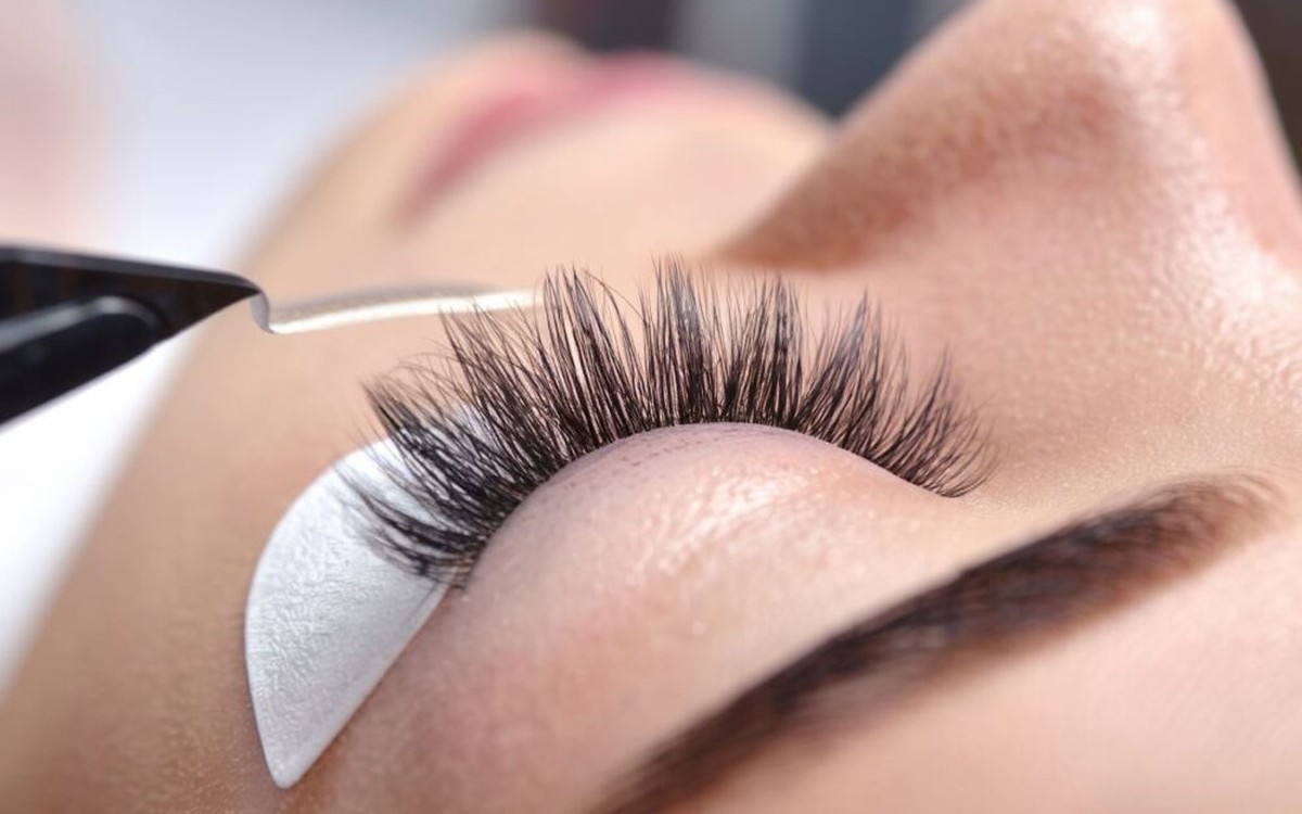 Close-up of volume eyelash extensions during a professional lash application.